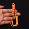 Filo di perline cilindriche in pietra imperiale nei toni vivaci dell'arancione e rosso - 4x8mm / Mix Arancio Rosso