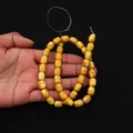 Perle ovali gialle con venature marmorizzate per la creazione di gioielli artigianali fai-da-te - 8X10mm / Giallo Brillante Venato Marrone (N. 6)