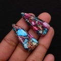 Macro shot of triangle sea sediment jasper stone pendants with vibrant textures and pre-drilled holes - 15x34mm / Blue Magenta Earth (No.6)