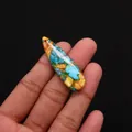 Handheld water drop shaped turquoise stone pendant with vibrant blue and orange marble textures - Sky Blue Orange Yellow Metallic Texture Style (No. 5)