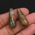 Macro shot of polished teardrop-shaped natural unakite stone beads for DIY jewelry making - 10x25mm, 5g / Unakite