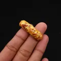 Polished natural yellow Emperor stone cylinder bead with unique red-brown veining - Cylindrical Curved Style / No. 18 (Yellow Red Brown)