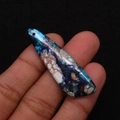 Irregular turquoise natural stone pendant with blue marble patterns and pre-drilled hole - 13x45mm / Blue/Teal/Red-Brown Veined