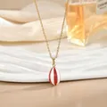 Detalle del colgante de globo aerostático chapado en oro con esmalte rojo y blanco - Estilo de Rayas Onduladas Rojas y Blancas (XL02453)