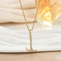 Detailed close-up of a luxury gold hammer pendant necklace with white zircon inlays - Hammer Style (XL02470)