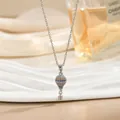 Detalle de un colgante de globo de aire caliente en plata con gemas de colores y circón - Estilo Plateado con Diamantes de Imitación (XL02457GA)