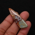 Irregular natural stone pendant in blue and earthy tones with a top-drilled hole - 13x45mm / Red-Brown/Cream/Cyan Veined