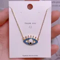Detail von Evil Eye Anhänger mit blauem Emaille und Zirkonia an goldener Kette - Goldener Emaille-Wimpernauge-Anhänger (YJ007)