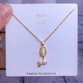 Détail du pendentif tulipe avec pierre d'opale et zircons sur carte de bijoux - Style Tulipe Opale Blanche (YJX0015)