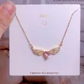 Collier ailes d'ange en or rose avec pierre de cœur rose et diamants étincelants - Style Cœur Rose Ailes d'Ange Or Rose (CB17)