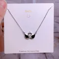 Collier cygne en argent avec des ailes en émail noir et de brillants zircons - Style Strass Email Noir Cœur Double Cygne (CB10)