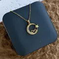 Détail du collier en acier inoxydable doré avec pendentif lune et étoile serti de zircon - Étoile Lune Signe de l'Infini Or (XL0607)