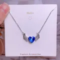 Collier en acier titane avec cristal cœur bleu foncé et pendentif ailes d'ange argent - Style Ailes Cristal Cœur Bleu Foncé Argent (CB38)