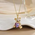 Collier élégant en titane doré avec ours, cristal de cœur violet et pierres de zircon - Ours Cœur Violet Or (XL0173)