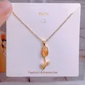 Collier tulipe doré orné d'une pierre œil-de-chat orange clair et de feuilles zircon - Style Tulipe Pierre de Lune Orange Clair (YJX0027)