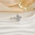 Elegant rotating star ring with white zircon inlays and adjustable silver band - Four-pointed Star Style (65)