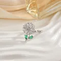 Rotating flower ring with silver band, clear zircon petals and green teardrop leaves - Green Leaf Flower Style (66)