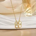 Elegant gold titanium steel necklace with heart-shaped clover pendant and shell inlay - Shell Spliced Gold (XL0554)