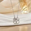 Elegant silver four-leaf clover necklace with opal and zircon hearts on silk background - Opal Spliced Silver (XL0554G)