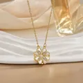 Golden magnetic clover heart necklace with zircon inlay on a soft silk background - Mother of Pearl Gold (XL0553)