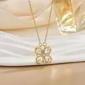 Versatile gold four-leaf clover necklace with sparkling zircons and water drop gemstones - Pear Cut Inlaid Gold (XL0552)