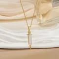 18k gold plated syringe pendant necklace with white enamel and zircon accents - Syringe Shape (XL0607)