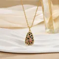 Detail of 18K gold plated teardrop pendant with enamel evil eye and hollow geometric pattern - Evil Eye Hollow Style (XL0657)