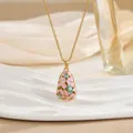 Detail of pink enamel egg pendant with evil eye charms on a gold-plated link necklace - Pink Evil Eye Style (XL0658)