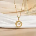 Detail of a gold flower necklace featuring a sparkling dancing stone with cubic zirconia - Hollow Flower Style (灵动系列42) / Gold