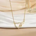 Detailaufnahme der goldenen Unendlichkeit-Halskette mit Herzanhänger und Zirkonia - Ineinandergreifendes Herz Unendlichkeitssymbol