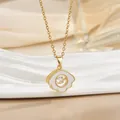 Detailed close-up of a gold flower pendant necklace with white inlay and center diamond - Dancing Four-leaf Flower (灵动系列54) / Gold