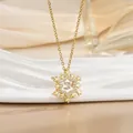 Detailed view of a gold snowflake pendant necklace with sparkling inlaid diamonds - Gorgeous Snowflake Style (灵动系列57) / Gold
