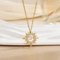 Detail of gold sun star pendant with sparkling cubic zirconia on white ceramic base - Radiant Sun Star (灵动系列58) / Gold