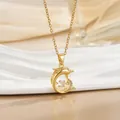 French style gold dolphin necklace with sparkling zircon stone on a white display - Leaping Dolphin Style (灵动系列66) / Gold