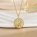 Detail of a rotating golden windmill pendant with white crystals and engraved characters - Round Pave Zirconia Style (XL0957)