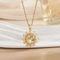 Macro shot of gold rotating sunflower necklace with pavé marquise-cut zircon stones - Sunflower Windmill Style (XL0960)