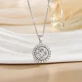 Close-up of rotatable spinning pendant with crystal border and Chinese characters - Silver Tone Round Style (XL0962G)