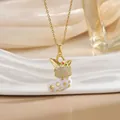 Collier élégant avec pendentif chaussette de Noël en acier titane doré et zircons - Style Chaussette de Noël (XL0918) / Or