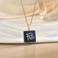Close-up of golden cross chain with blue enamel square pendant featuring Fé engraving - Gold Square Blue Enamel Letter (XL1103C)