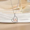 Two-tone heart necklace with baby footprints and sparkling cubic zirconia for Mother Day - Two-tone Baby Feet (XL1081GB)