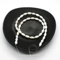 Natural white freshwater shell beads in oval rice shape for DIY jewelry making - Seed Beads