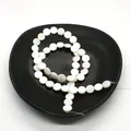Natural white mother of pearl shell beads in flat disc shape for DIY jewelry making - Disc