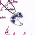 Dettaglio pendente a cuore albero della vita in filo d'argento con pietre blu - Lapislazzulo