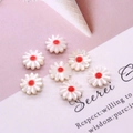 Detailed view of white daisy flower beads with red centers for DIY jewelry making - 10mm / Red Center (No.1)