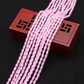 Macro detail of faceted pink teardrop crystal beads for DIY jewelry making - 4x6MM / Light Pink (No.2)