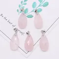 Close-up of five faceted rose quartz teardrop pendants with silver bails on a white card - 13x25mm / Rose Quartz