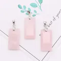 Three pieces of rectangular rose quartz pendants with silver metal clasps on a white card - 3-Pack / Rose Quartz