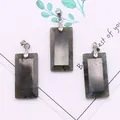 Detailed macro view of three rectangular labradorite pendants with silver bail connectors - 3-Pack / Flash Stone (Labradorite)