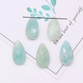 Detail showing five teardrop faceted Amazonite stones with natural white textures - 13x25mm / Amazonite