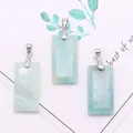 Macro detail of three rectangular natural Amazonite stone pendants with silver clasps - 3-Pack / Amazonite